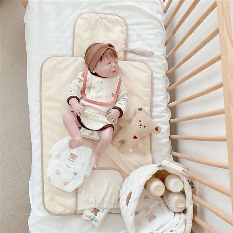 AMOR TINY Portable Waterproof Changing Pad – Travel Diaper Mat with Wipes Pocket